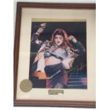 A signed print of Madonna with COA, approx 30cm x