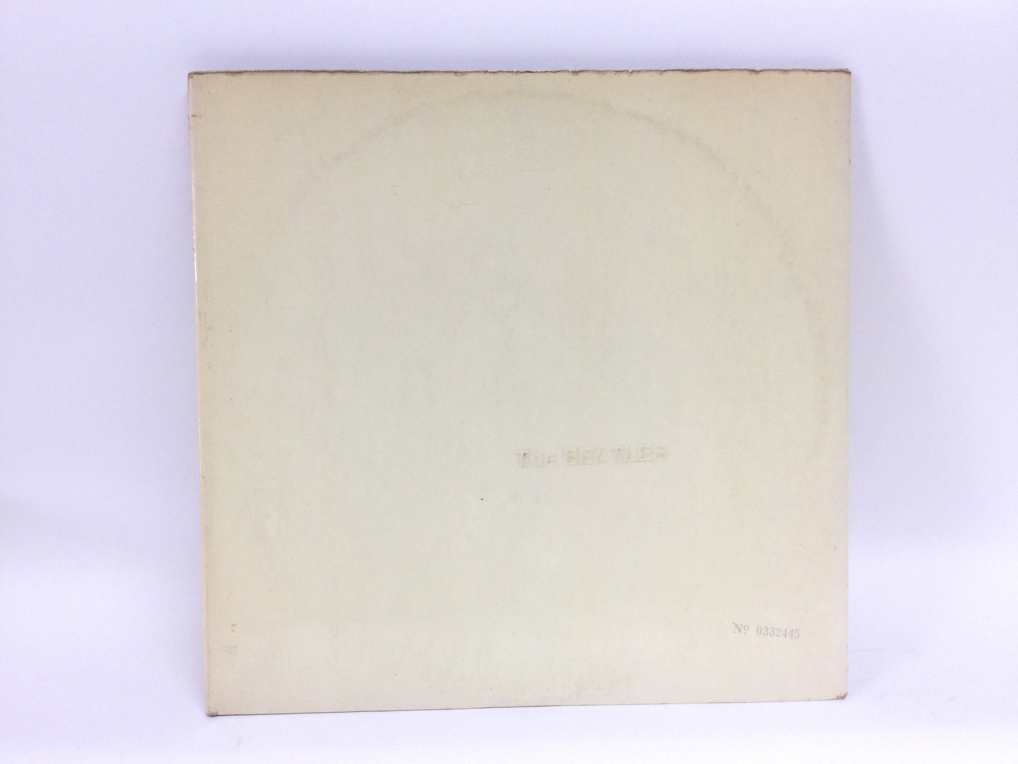 A numbered Beatles 'White Album', no. 0332445, top