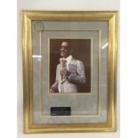 A framed Sammy Davis Jr signed print. No COA. Appr