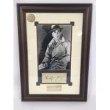 A framed presentation of Humphrey Bogart with auto