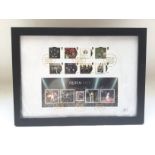 A framed limited edition set of Queen album cover