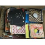 A box of record covers and company sleeves. Instan