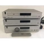 An Arcam DV27 DVD player, Arcam T21 tuner, an Arca
