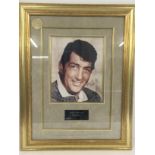 A framed Dean Martin signed print. Comes with COA.