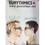 A signed Eurythmics poster, approx 76cm x 52cm. Ro