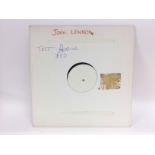 A white label test pressing disc for the John Lenn