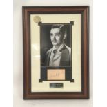 A framed presentation of Cary Grant with autograph