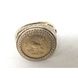 A 9carat gold ring set wit a 1/10 gold Krugerrand