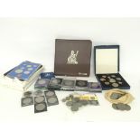 A coin album and a collection of commemorative cro
