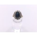 18ct gold diamond & sapphire cluster ring. Approx