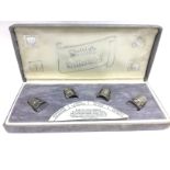 A cased set of silver thimbles. Cat B
