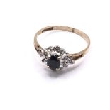 9ct gold diamond & sapphire cluster ring. Approx 1