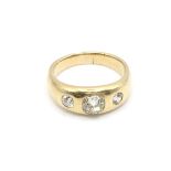 An 18ct 3 diamond gypsy ring. Size O and 8g. Centr