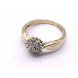 9ct gold diamond cluster ring. Approx 2.5g. Ring s