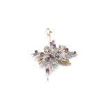 A quality 18ct gold brooch set with diamonds and r