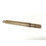 A 9ct gold pencil holder. 5g ( A).