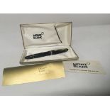 A Mont Blanc fountain pen in a fitted case with pa