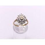 9ct gold diamond cluster ring. Approx 2.7g. Ring s