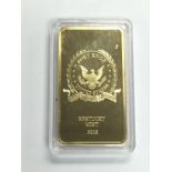 A 2018 Kentucky Mint 1oz gold plated bar. Shipping category A.