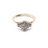 9ct gold diamond cluster ring. Approx 1.9g. Ring s