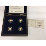 Four 0.5g 14ct gold proof rounds with COA Postage