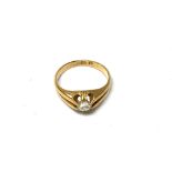 An 18ct gold old cut diamond ring set with a 0.40c