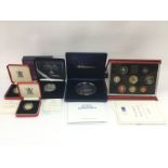 Five cased coin proof sets comprising a 1995 UK coin collection, 2oz silver 2003 Rugby Commemorative