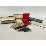 A large collection of pens including Waterman, Par