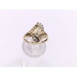 14ct gold diamond swirl cluster ring. Approx 3.2g.