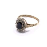 9ct gold diamond & sapphire cluster ring. Approx 2