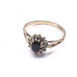 9ct gold diamond & sapphire cluster ring. Approx 1