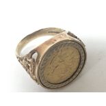 A Gold ring set with a 1912 half sovereign total w