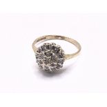 9ct gold diamond cluster ring. Approx 2.2g. Ring s