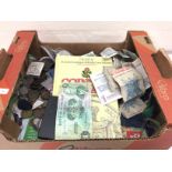 A box of mixed coins including pennies, cents, Dol