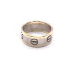 18ct gold 2 colour Cartier style ring. Approx 9.5g. Ring size R. Postage category A.