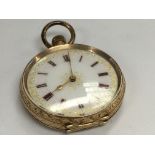 A gold fob button wind pocket watch the enamel dia