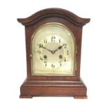 Vintage mahogany clock with silvered dial, key and