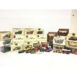 A collection of model and die cast cars including