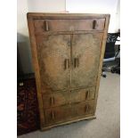 An Art Deco walnut bedroom cabinet 72x43x134