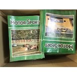 A collection of motor sports magazines predominant