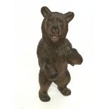 A small carved Black Forest bear, approximately 14