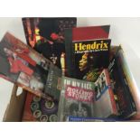 A box of music books, music programs and a boxed c