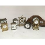 A collection of small clocks including a carriage