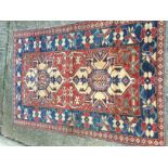 Two hand knotted rugs, approx 120cm x 180cm and 97