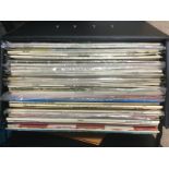 A record case of LPs by various artists including