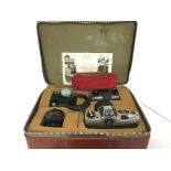 Chinon CX cased camera including accessories. Post