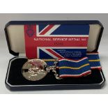 A cased National Service medal 1939-1960. (A) NO R