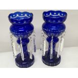 A Pair of blue overlay and cut glass lusters with