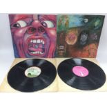 Two early UK pressings of King Crimson LPs compris