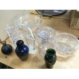 A collection of glass decanters , vases etc . Post